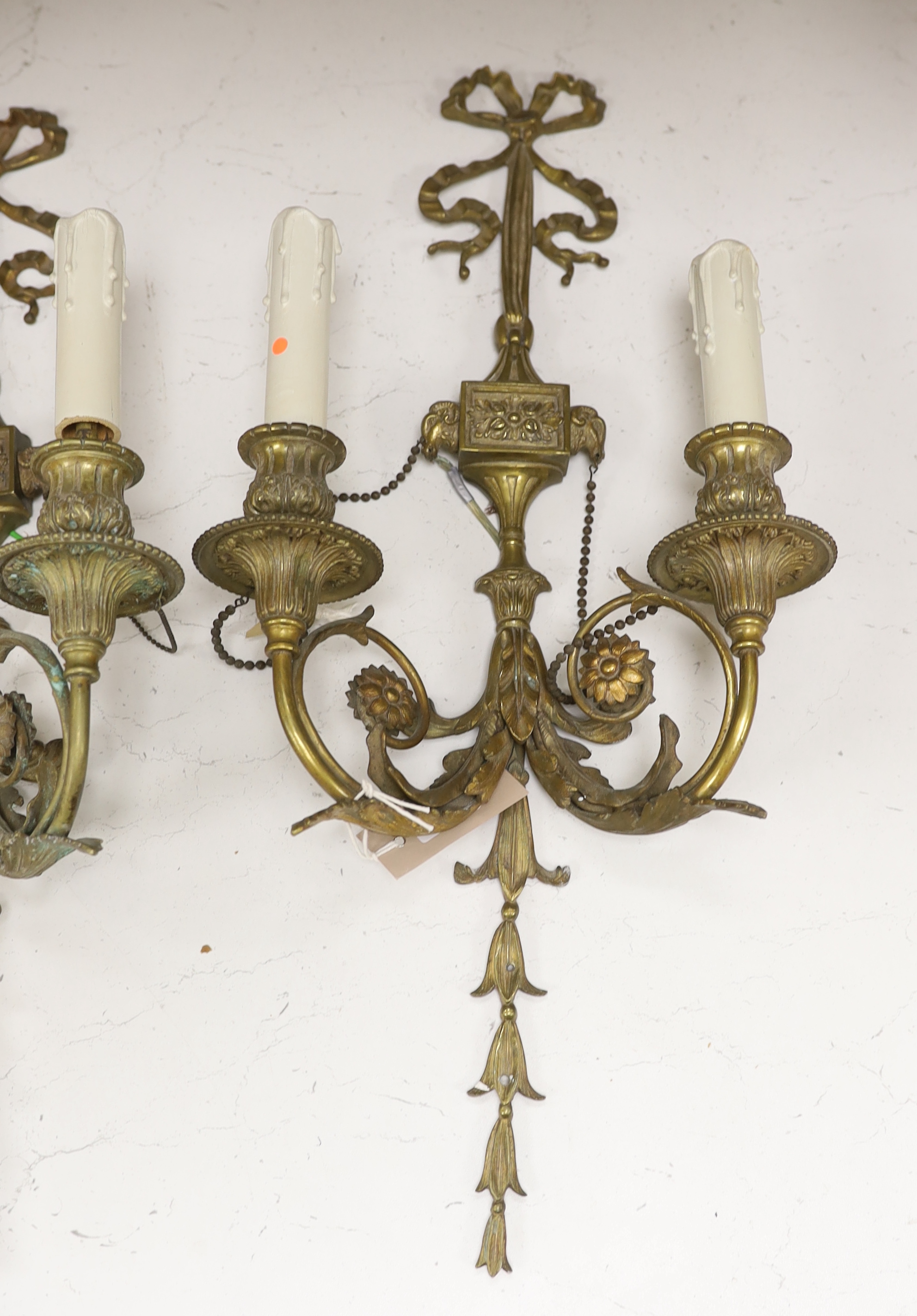 A pair of French Louis XVI style two branch ormolu wall lights, 60cm high